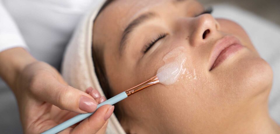high-angle-woman-getting-massaged-spa