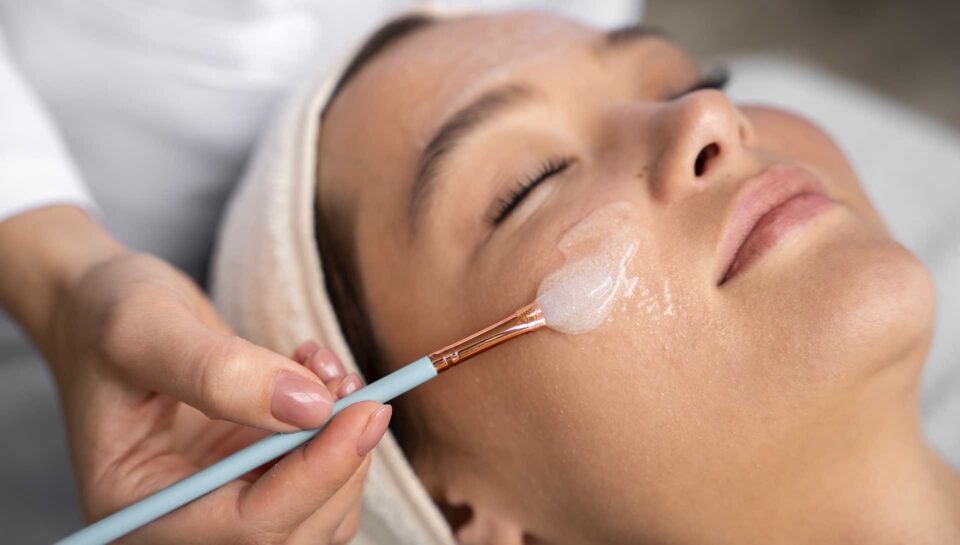 high-angle-woman-getting-massaged-spa